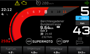 Motorcycle cluster with route guidance, rain mode, tyre pressure and consumption readouts